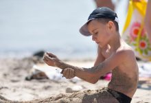 Boy washing body instead of cap